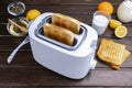 Slices of toast coming out of the toaster for healthy breakfast Royalty Free Stock Photo