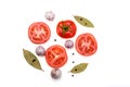 Slices of tomatoes, bay leaf, pepper and garlic Royalty Free Stock Photo