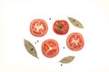 Slices of tomatoes, bay leaf, pepper Royalty Free Stock Photo