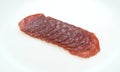 Slices of uncured soppressata dry salami in a row