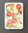Slices of vegetables carrot, tomatoes, basil, cucumber, in the plastic package isolated, fresh salat always concept,