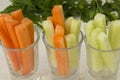 Slices of vegetables, cucumber and carrots in stacks