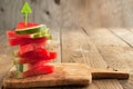 Slices of watermelon on chopping board