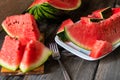 Slices of watermelon on old wooden rustic table Royalty Free Stock Photo