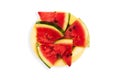 Slices of watermelon in a yellow plate. Slices of chopped fresh watermelon in a plate isolated on white background