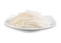 Slices white radish isolated on dish