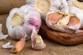 Slices and Whole bulb of garlic close up. Selective forus Royalty Free Stock Photo
