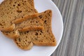 Slices of whole grain gluten free bread on a plate Royalty Free Stock Photo