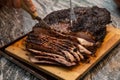 slicing a beef brisket fresh off of the smoker Royalty Free Stock Photo