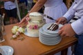 Slicing a cake at a newlyweds wedding