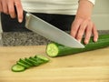 Slicing cucumber Royalty Free Stock Photo