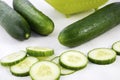 Slicing green cucumbers Royalty Free Stock Photo