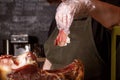 Slicing jamon at the butcher& x27;s shop. Close-up. Royalty Free Stock Photo