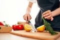 slicing lemon on the board with a knife kitchen cooking ingredients Royalty Free Stock Photo