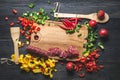 Slicing sausage on cutting Board with ingredients