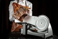 Slicing Spanish jamon iberico. Spanish jamon and traditional food Royalty Free Stock Photo