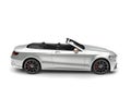 Slick silver modern luxury convertible car - side view Royalty Free Stock Photo
