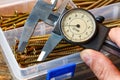 Slide caliper with round scale in the man hand Royalty Free Stock Photo