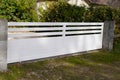 Slide classic white door aluminum home gate portal of suburbs house Royalty Free Stock Photo