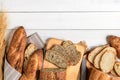 slide multi grain sourdough bread and sliced Baguette on white wood Royalty Free Stock Photo