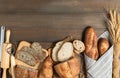 slide multi grain sourdough bread and sliced Baguette on wood background Royalty Free Stock Photo