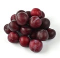 Slide of organic plums on white background Royalty Free Stock Photo