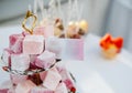 Slide of pink marshmallow with advertising card