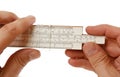 Slide rule in hand Royalty Free Stock Photo