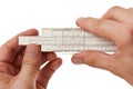 Slide rule in hand Royalty Free Stock Photo