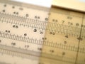 Slide rule showing pi