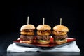 Sliders beef tall mini burgers sharing food Royalty Free Stock Photo