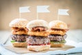 Sliders beef tall mini burgers sharing food Royalty Free Stock Photo