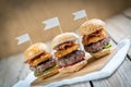 Sliders beef tall mini burgers sharing food Royalty Free Stock Photo