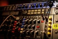 Sliders and knobs at an audio mixing console. Royalty Free Stock Photo
