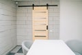 Sliding Barn Door on Foam Brick Wall and Furniture