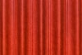 Sliding door, red curtain scene from the leather of the conference room in the hotel. Wavy abstract pattern wall texture