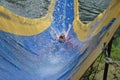 Sliding Down Camp Waterslide Royalty Free Stock Photo