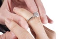 Sliding the engagement ring on Royalty Free Stock Photo