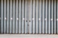 Sliding and folding industrial doors with No Smoking signs Royalty Free Stock Photo