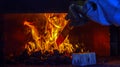 Sliding metal into red hot flames inside coal forge Royalty Free Stock Photo