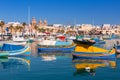 Sliema, Malta - January 10, 2020: Traditional fishing boats in the Mediterranean Village of Marsaxlokk, Malta Royalty Free Stock Photo