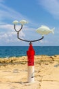 Weather vane with three saddled breams Oblada melanura, at Exiles Beach, Sliema, Malta Royalty Free Stock Photo