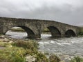 Sligachan Old Bridge with beautiful view on Black Cuillin mountains, in Isle of Skye, Scotland Royalty Free Stock Photo