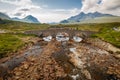 Sligachan Old Bridge with beautiful view on Black Cuillin mountains, in Isle of Skye, Scotland Royalty Free Stock Photo