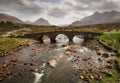 Sligachan Old Bridge with beautiful view on Black Cuillin mountains, in Isle of Skye, Scotland, UK Royalty Free Stock Photo