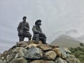 Sligachan Old Bridge collie and mackenzie statue in mountains, in Isle of Skye, Scotland Royalty Free Stock Photo