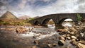 Sligachan old bridge on the Isle of Skye, Scotland. Located where the Black Cuillin meets Red a with Glen Sligachan between them. Royalty Free Stock Photo