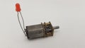 Small Geared Motor with Attached LED Royalty Free Stock Photo