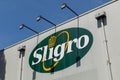 Sligro logo sign with spots. Sligro encompasses food retail and foodservice companies