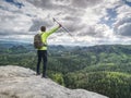 Slim body trek runner with backpack and trekking poles walk Royalty Free Stock Photo